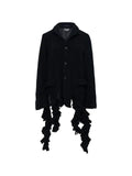Black Comme Des Garçons ruffled tweed jacket