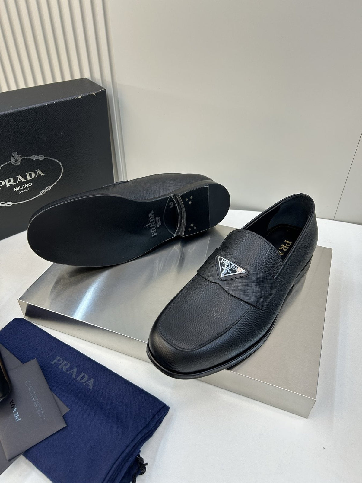 Prada Black Triangular Plaque Loafers